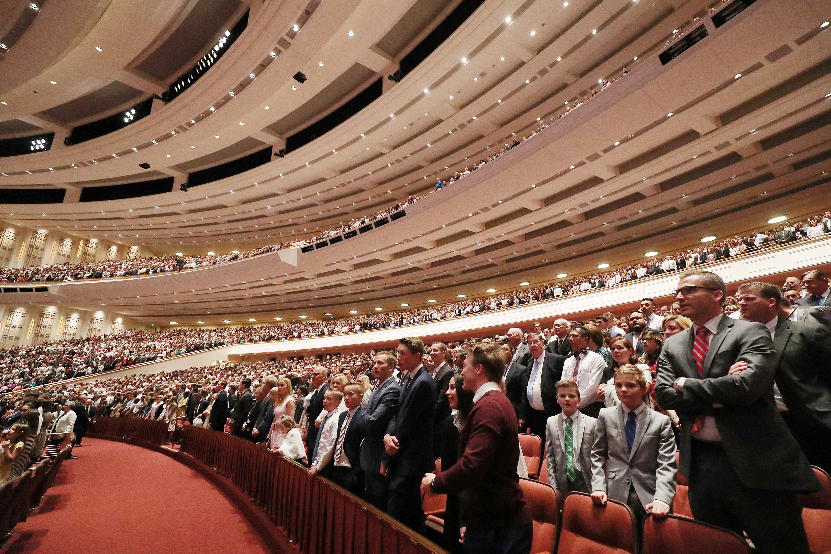 Conferencegoers sing a congregational hymn during the 189th Annual General Conference of The Church of Jesus Christ of Latter-day Saints in Salt Lake City on Sunday, April 7, 2019.