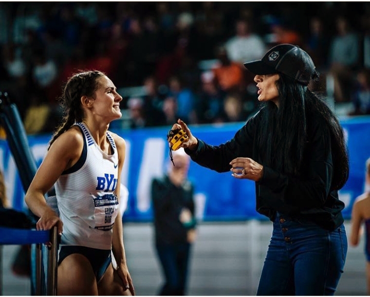 BYU athlete Erica Birk-Jarvis confers with her Coach Diljeet Taylor during a recent indoor track meet.