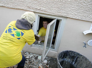 Missionaries joined local members and others to clear out a basement after Superstorm Sandy.Missionaries joined local members and others to clear out a basement after Superstorm Sandy.