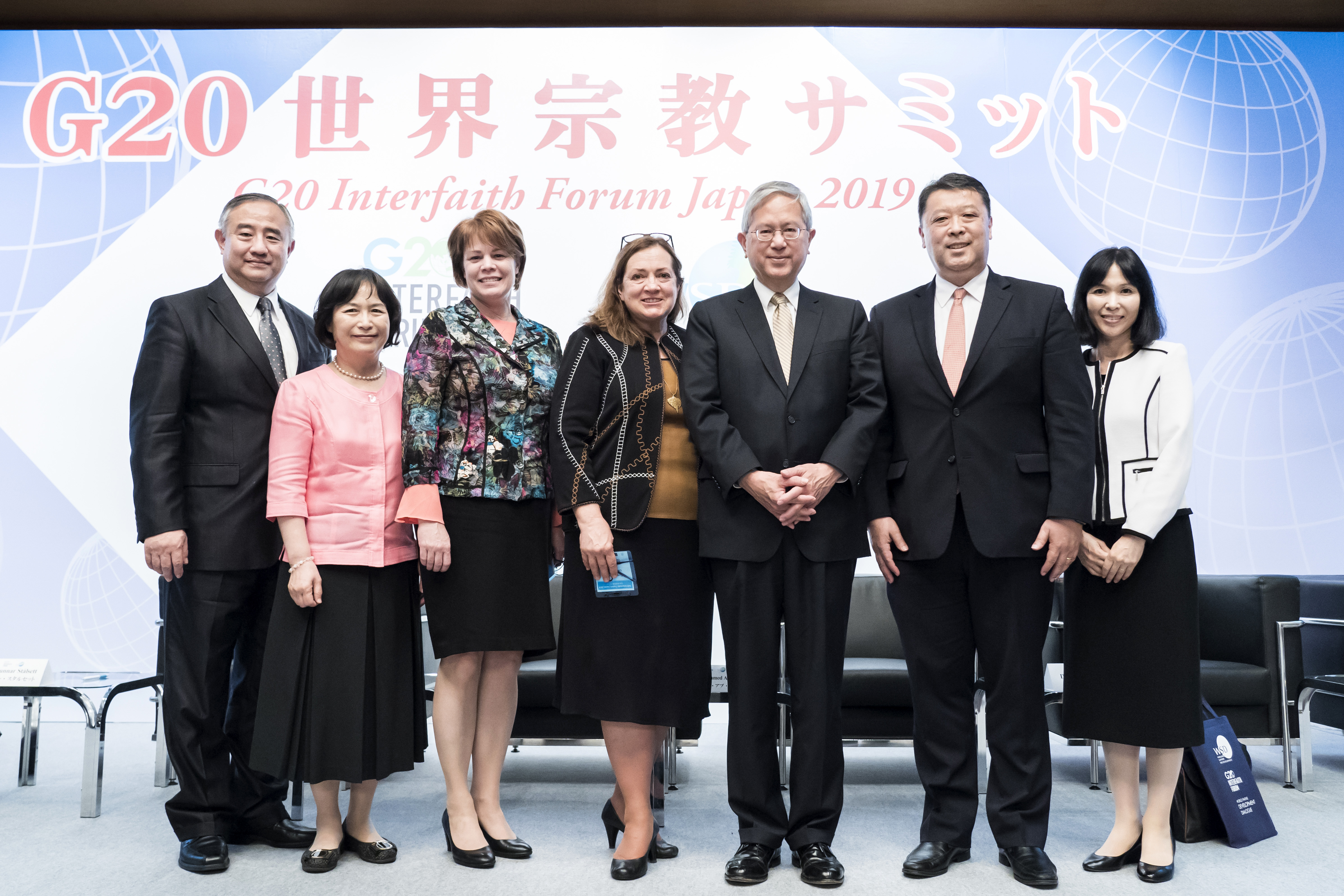 Elder Gerrit W. Gong of the Quorum of the Twelve Apostles of The Church of Jesus Christ of Latter-day Saints, center right, poses for a photograph during the G20 Interfaith Forum in Chiba, Japan, on Saturday, June 8, 2019.