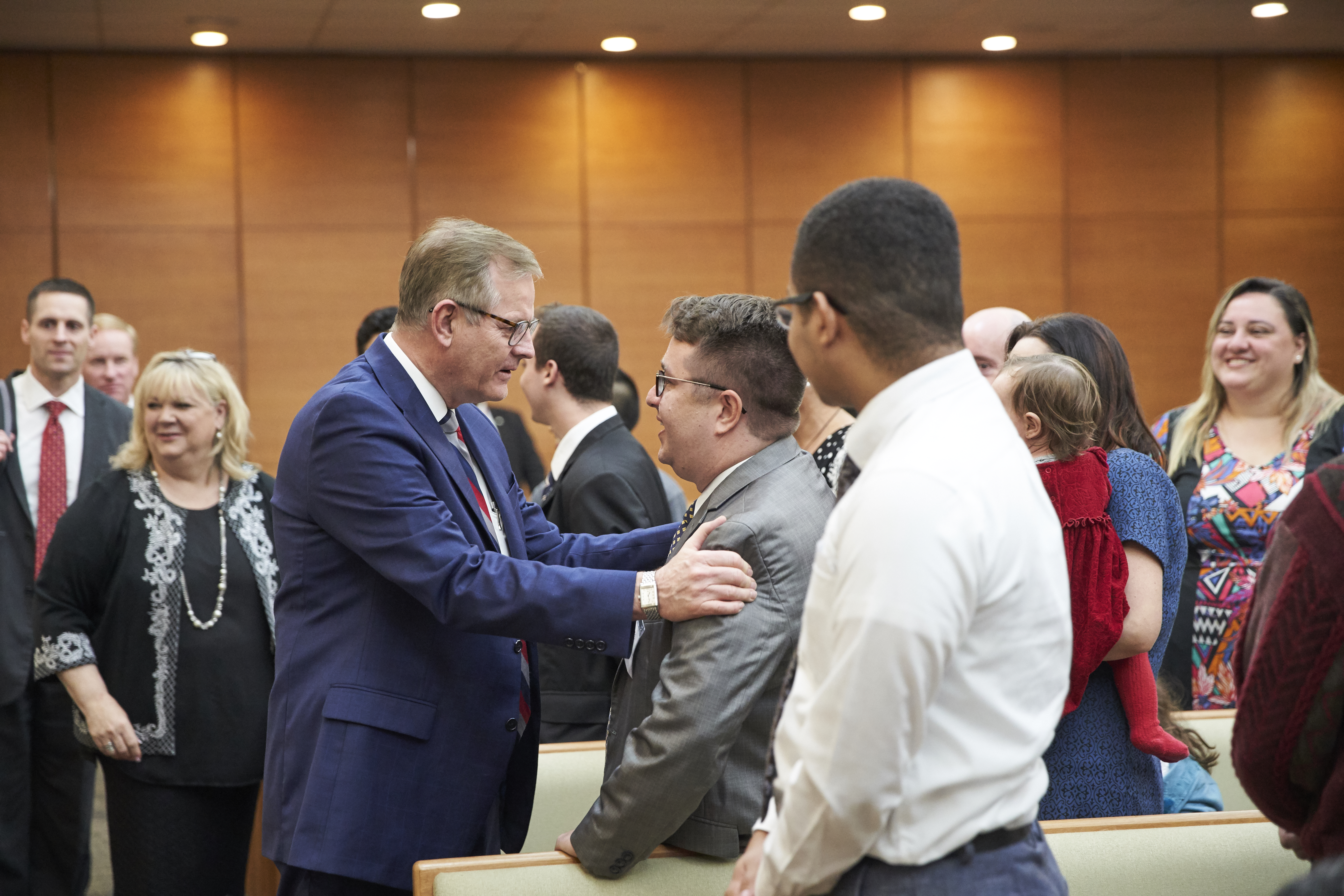Elder Gary E. Stevenson and Sister Lesa Stevenson greet members gathered in Sao Paulo, Brazil.