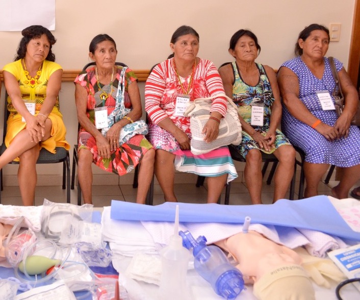 Midwives from Brazil's Guajajara tribe listen to neonatal care instruction at October, 2018, training seminar. The event was co-sponsored by the Church.