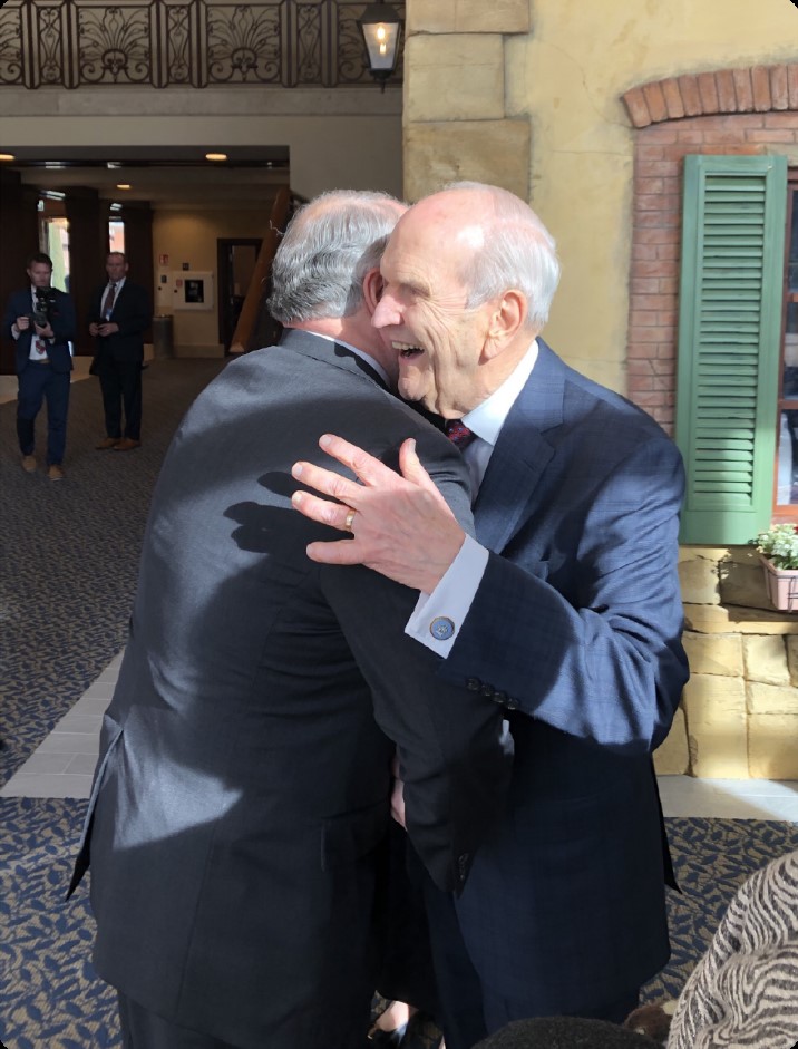 Elder Ronald A. Rasband receives a hug from President Russell M. Nelson on March 9, 2019, in Rome, Italy.