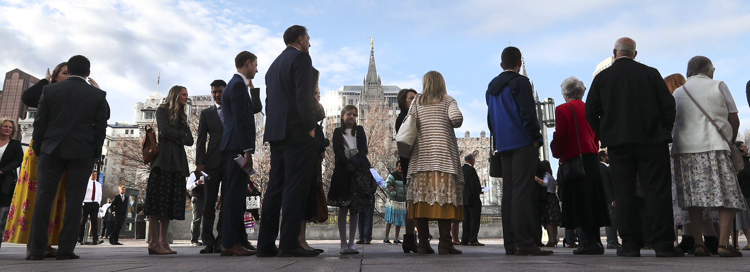 Latter-day Saints wait in line at the Conference Center before the Saturday morning session of the 189th Annual General Conference of The Church of Jesus Christ of Latter-day Saints in Salt Lake City on Saturday, April 6, 2019.