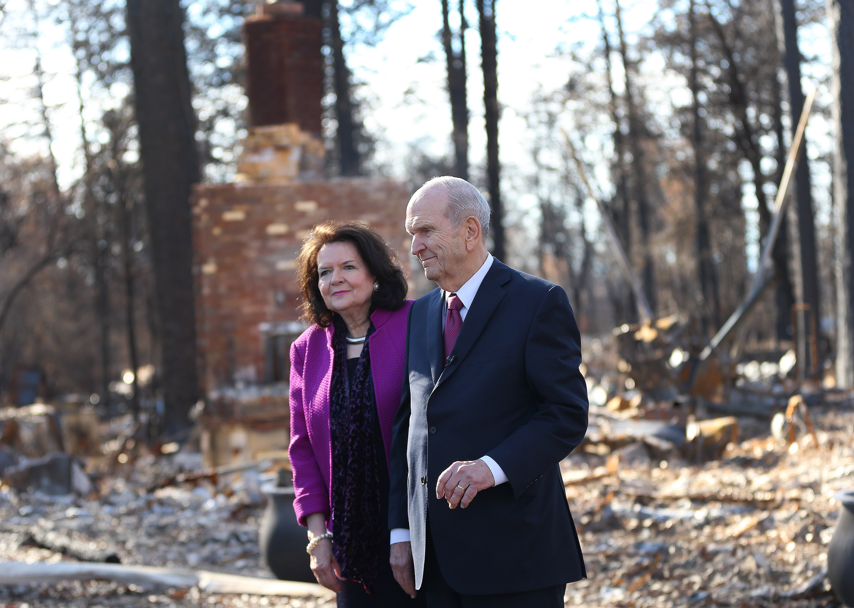 President Russell M. Nelson of The Church of Jesus Christ of Latter-day Saints looks over destroyed homes with his wife, Sister Wendy Nelson, in Paradise, California, on Sunday, Jan. 13, 2019, two months after the Camp Fire destroyed 1,400 homes and hundreds of businesses.