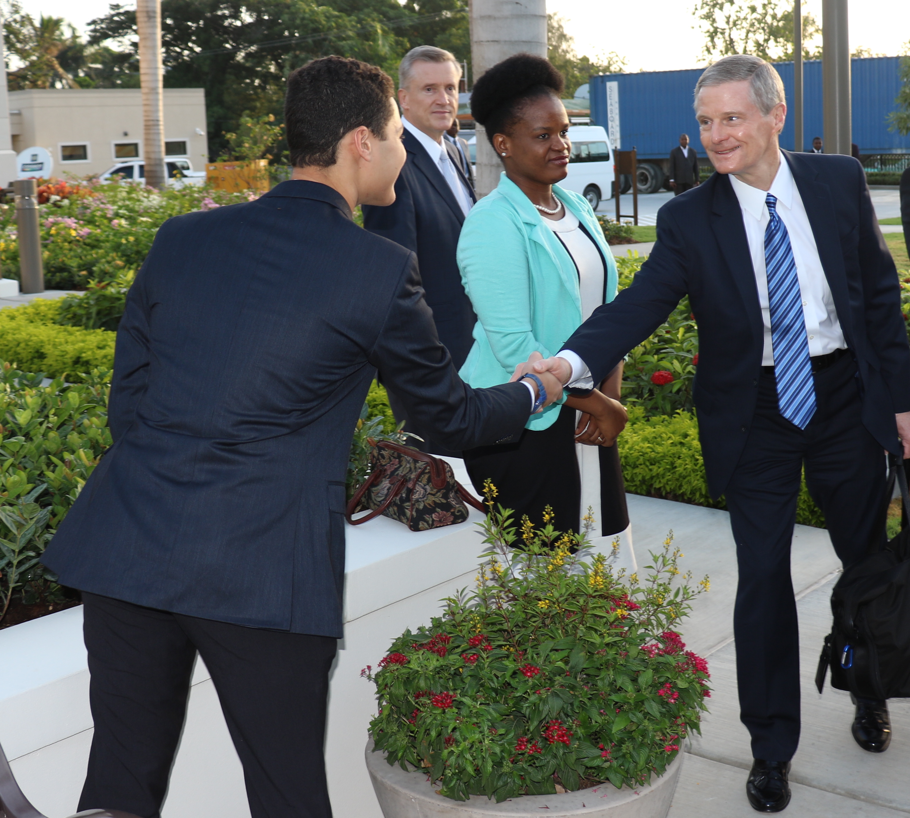 Elder David A. Bednar greets volunteers at the Sept. 1, 2019, dedication of the Port-au-Prince Haiti Temple