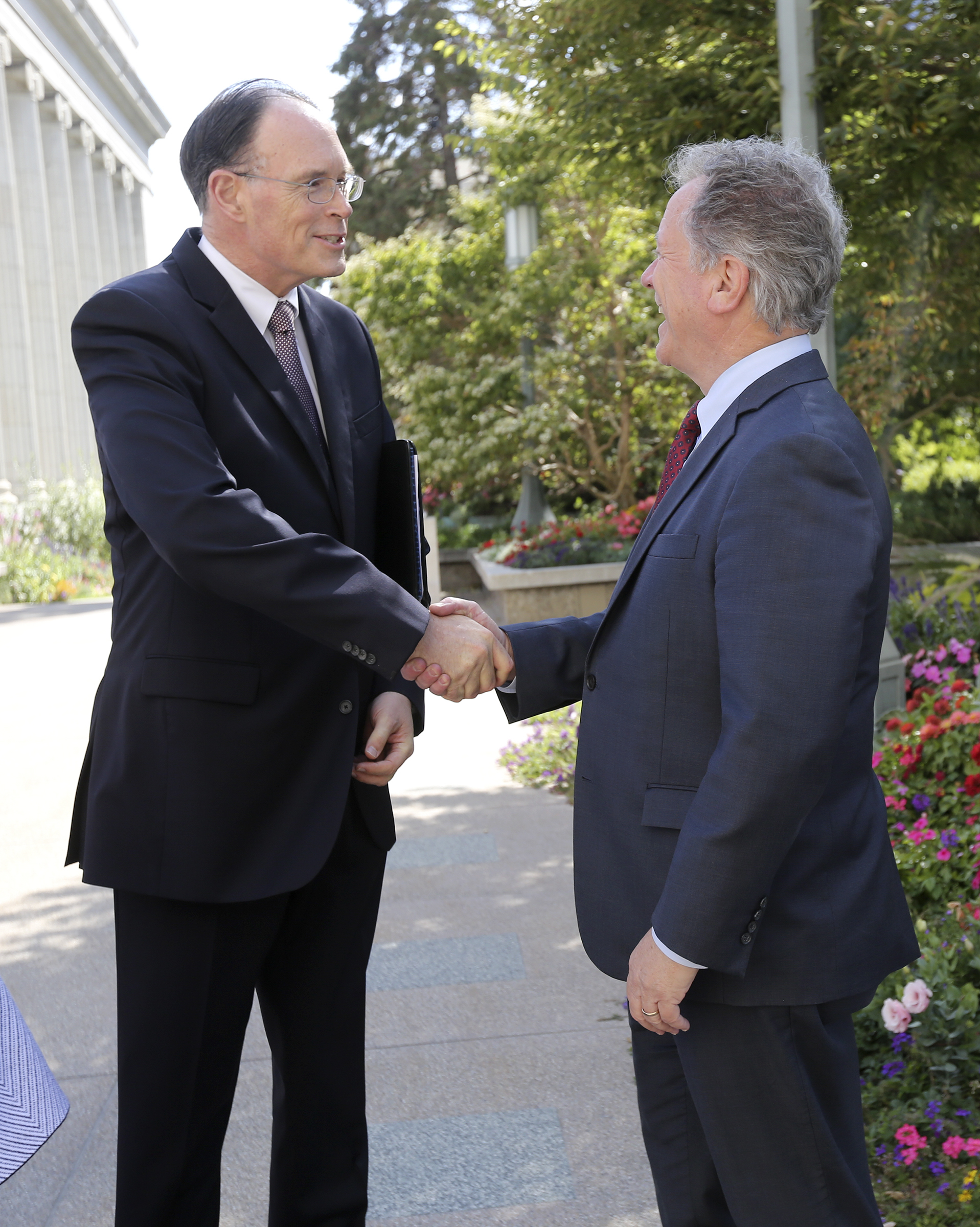 Bishop W. Christopher Waddell, second counselor in the Presiding Bishopric of The Church of Jesus Christ of Latter-day Saints, shakes hands with David Beasley, United Nations World Food Programme executive director, after they talked with members of the media at Temple Square in Salt Lake City on Monday, Sept. 30, 2019.