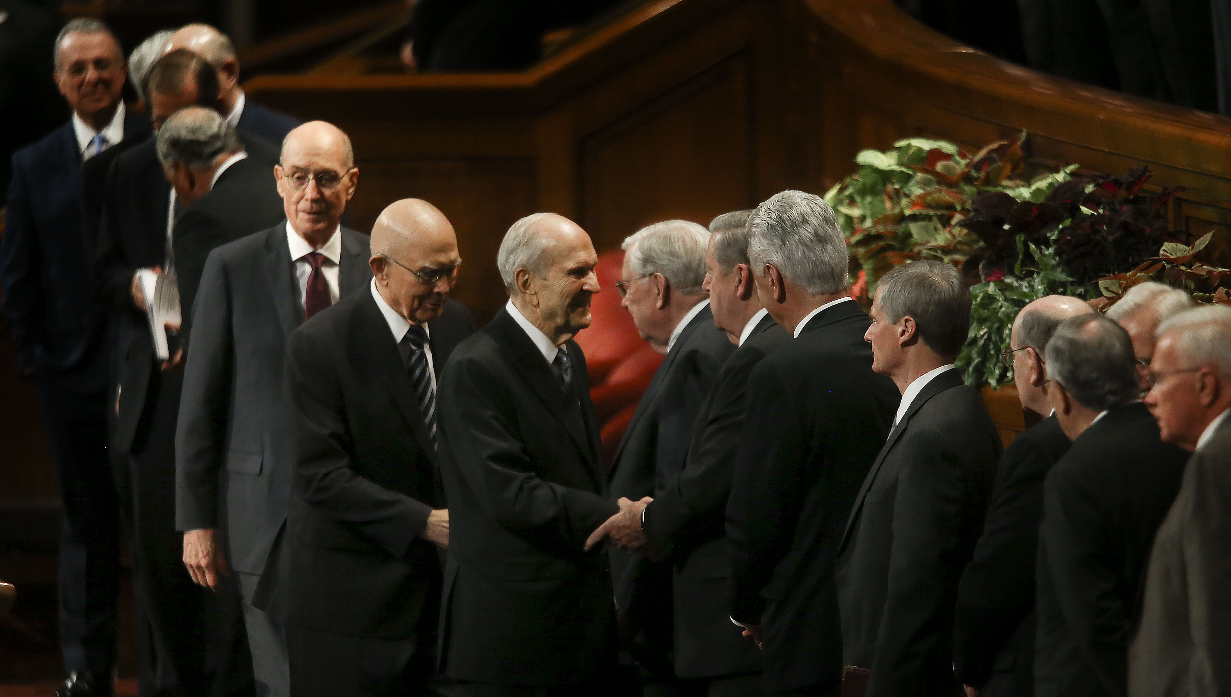 President Russell M. Nelson, center, shakes hands with general authorities after the Sunday afternoon session of the 189th Semiannual General Conference of The Church of Jesus Christ of Latter-day Saints in Salt Lake City on Sunday, Oct. 6, 2019. Following President Nelson is President Dallin H. Oaks, first counselor in the First Presidency, and President Henry B. Eyring, second counselor in the First Presidency.