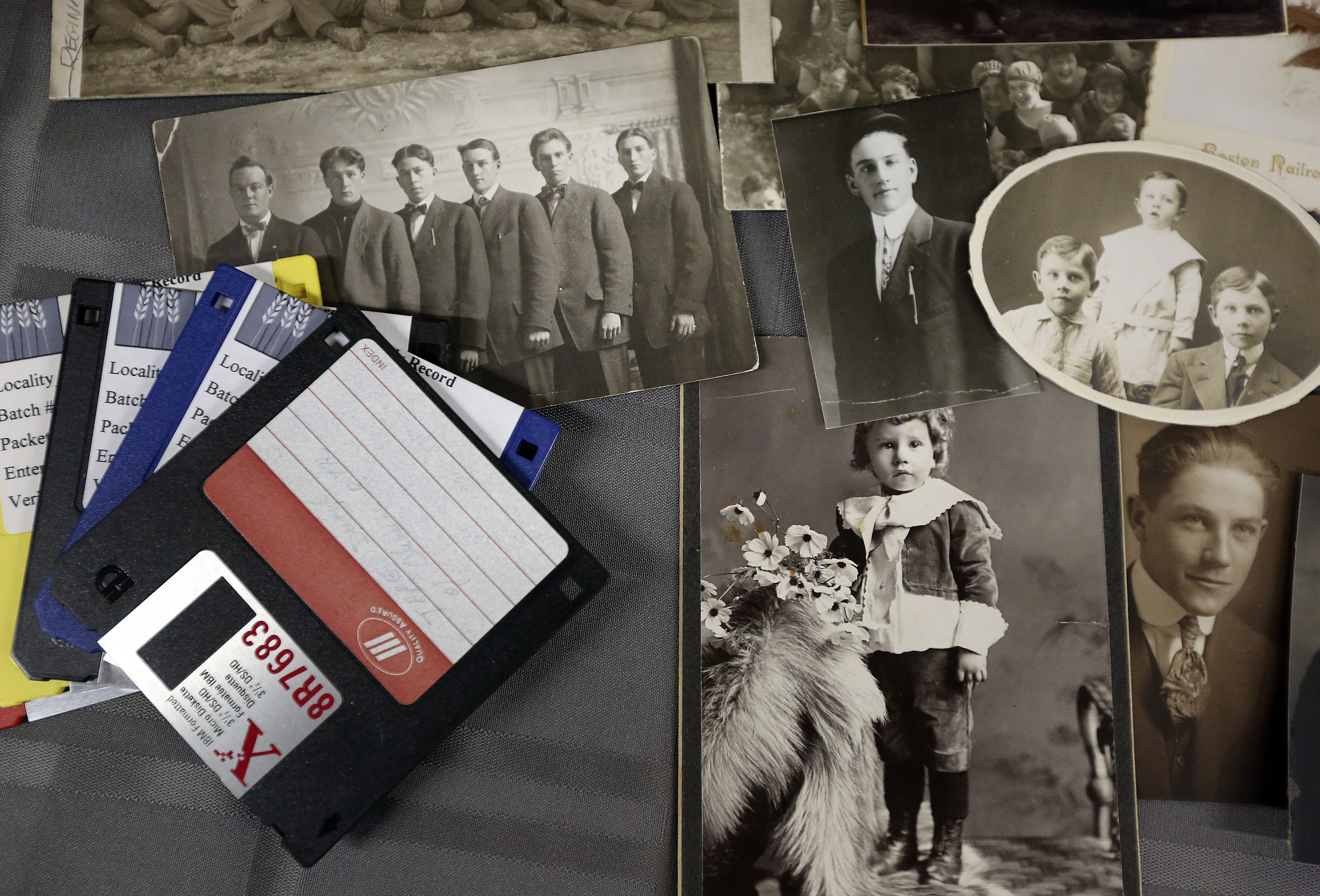 Display of historical photos and hard disks during the FamilySearch 125th anniversary celebration at the Family History Library in Salt Lake City on Wednesday, Nov. 13, 2019.