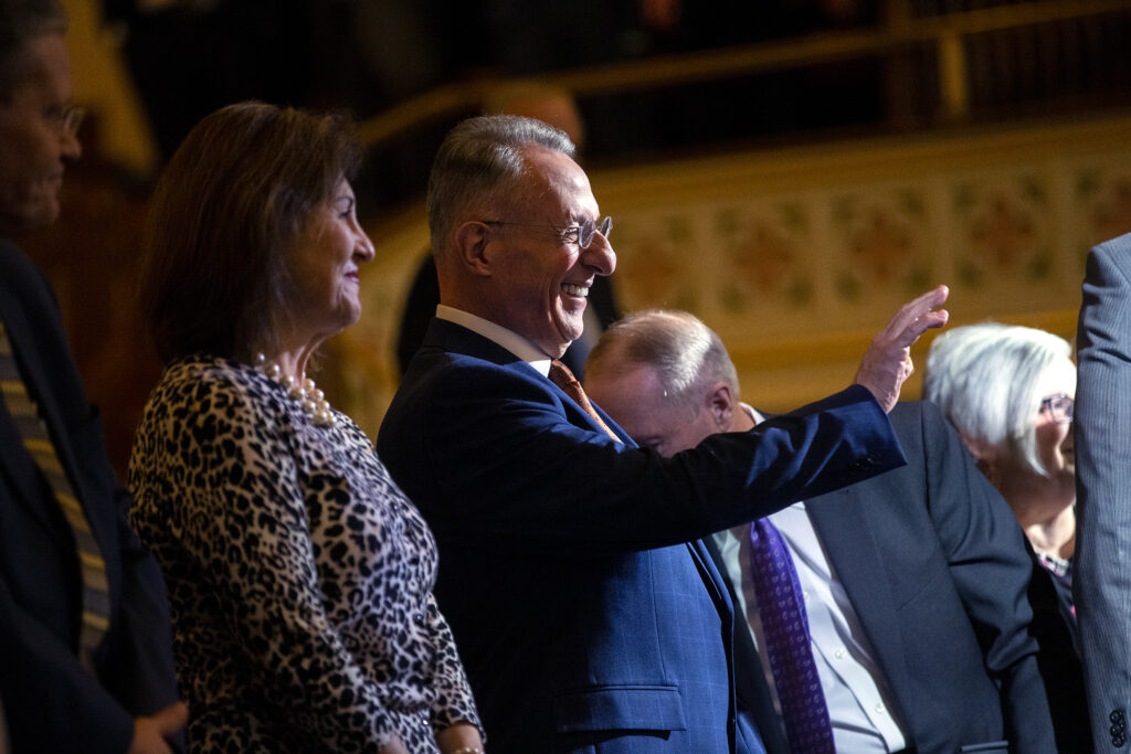 Elder Ulisses Soares of the Quorum of the Twelve Apostles of The Church of Jesus Christ of Latter-day Saints, is joined on the stand by his wife Rosana Soares as he prepares to speak to LDS Business College students at a devotional in the Assembly Hall on Temple Square in Salt Lake City on Tuesday, Jan. 28, 2020.