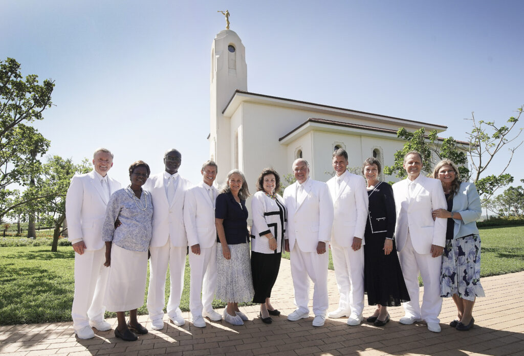 Elder Ronald A. Rasband, of The Church of Jesus Christ of Latter-day Saints’ Quorum of the Twelve Apostles, and Sister Melanie Rasband and others pose between sessions of the Durban South Africa Temple dedication in Umhlanga, South Africa,&nbsp; on Sunday, Feb. 16, 2020. From left: Elder Kevin R. Duncan, Sister Gladys Sitati, Elder Joseph W. Sitati, Elder S. Mark Palmer, Sister Jacqueline Palmer, Sister Melanie Rasband, Elder Ronald A. Rasband, Elder Carl B. Cook, Sister Lynette Cook, Elder Joni L. Koch and Sister Michelle Koch.