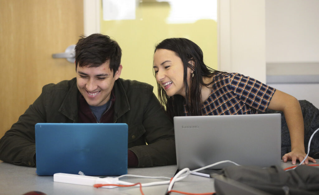 LDS Business College students Darwin Rios and Carolina Guzman work in class in Salt Lake City on Tuesday, Feb. 25, 2020. The college announced on Monday that it will become Ensign College on Sept. 1.