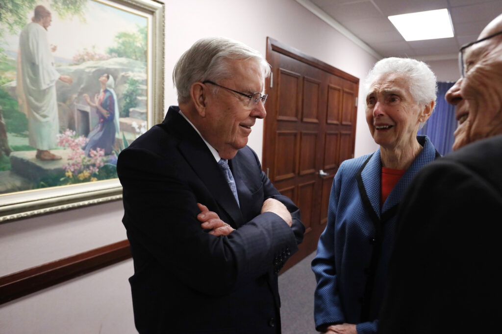 President M. Russell Ballard, acting president of the Quorum of the Twelve Apostles, greets friends June and Everett Pallin at the Brampton Stake Center in Brampton, Ontario, Canada, March 6, 2020.