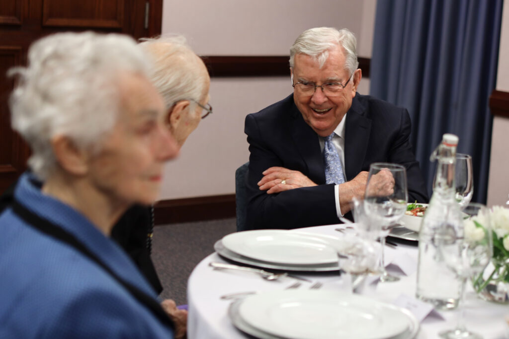 President M. Russell Ballard, acting president of the Quorum of the Twelve Apostles, has dinner with old friends at the Brampton Stake Center in Brampton, Ontario, Canada, March 6, 2020.
